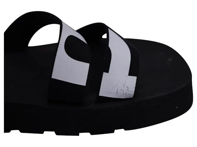 Sandalias con tira trasera y logo estampado de Proenza Schouler en lona negra 